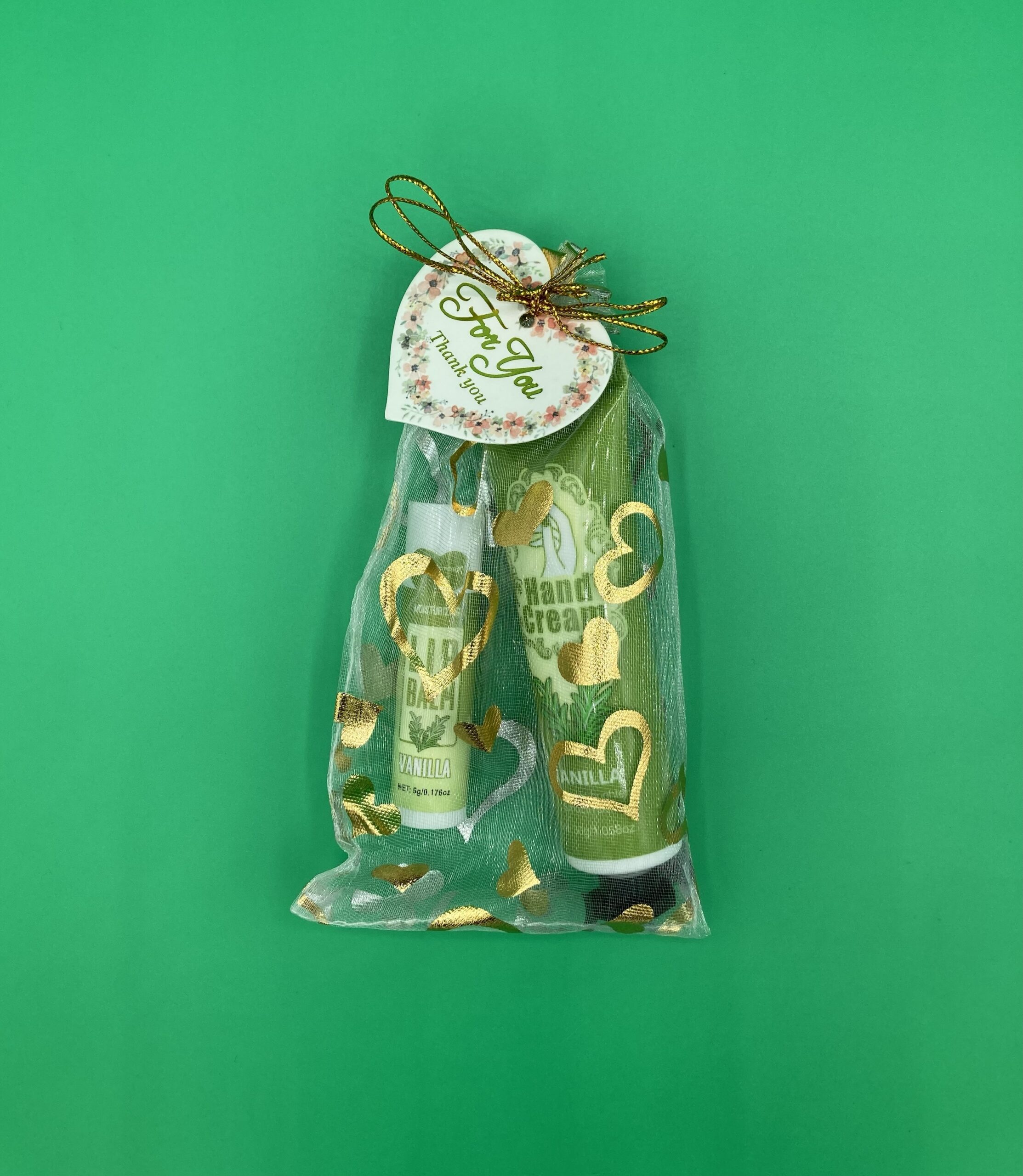 Kleines Dankeschön mit einer Handcreme und Lippenbalsam verpackt - Vanille