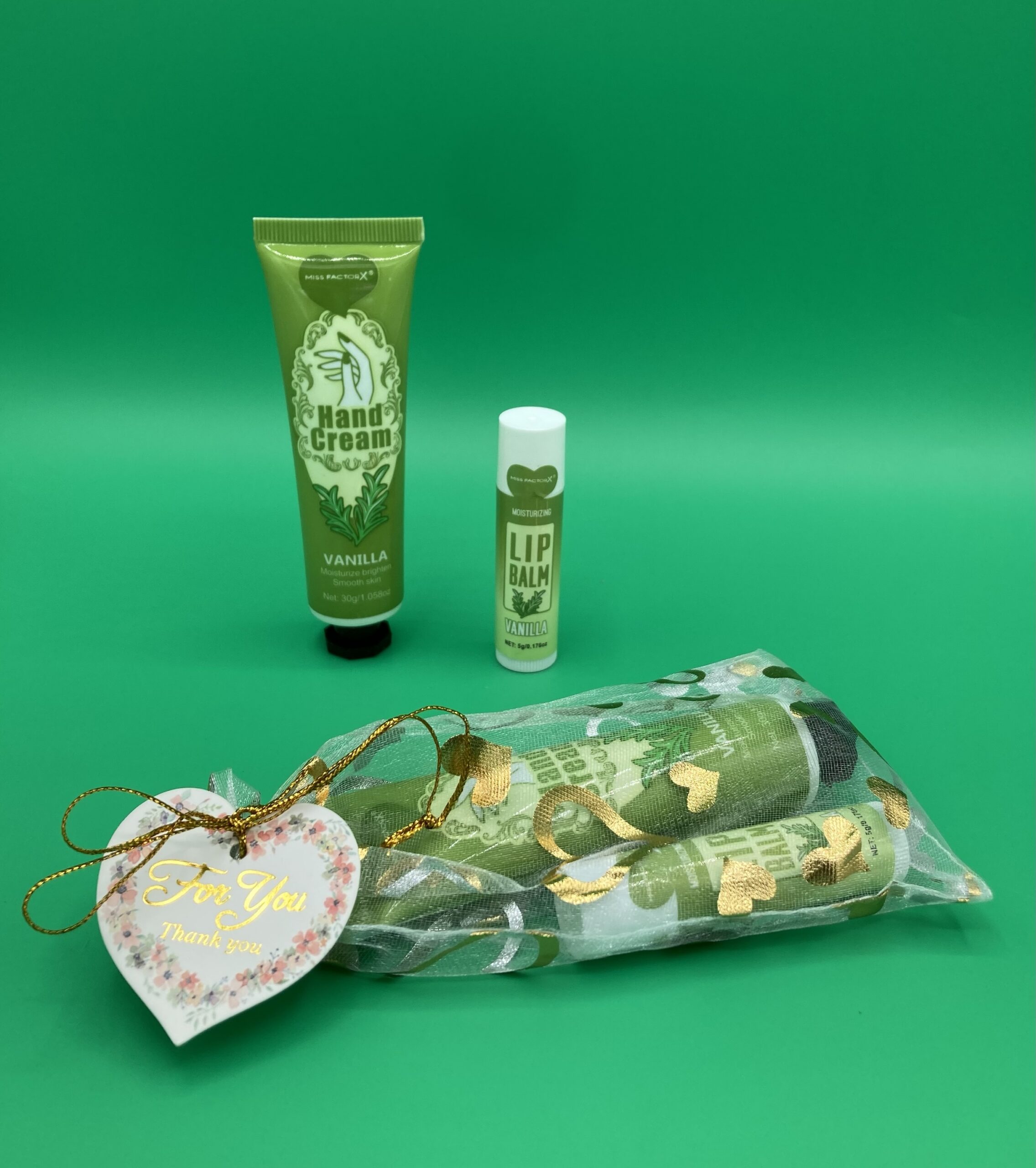 Kleines Dankeschön mit einer Handcreme und Lippenbalsam verpackt - Vanille – Bild 2