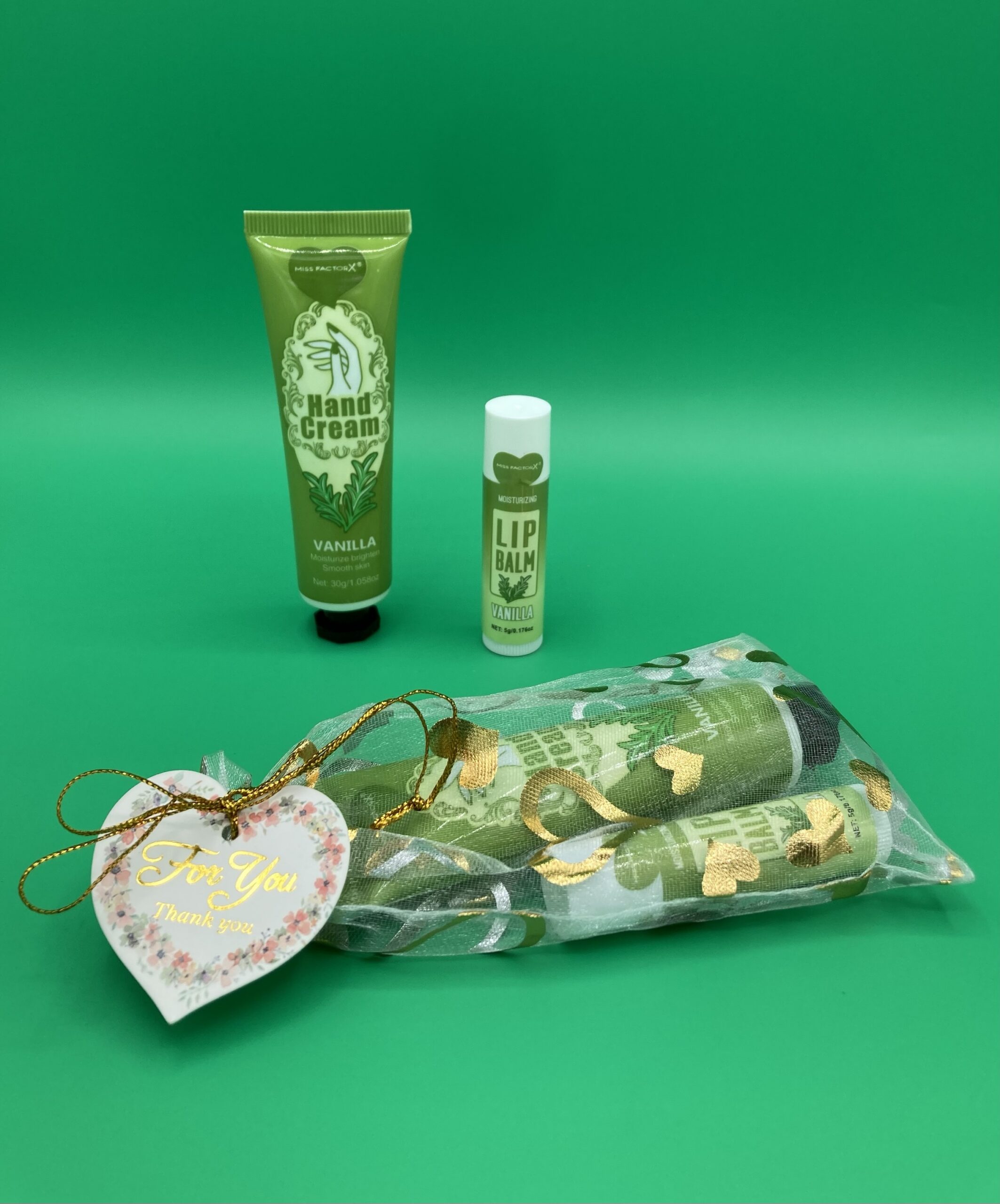 Kleines Dankeschön mit einer Handcreme und Lippenbalsam verpackt - Vanille – Bild 7