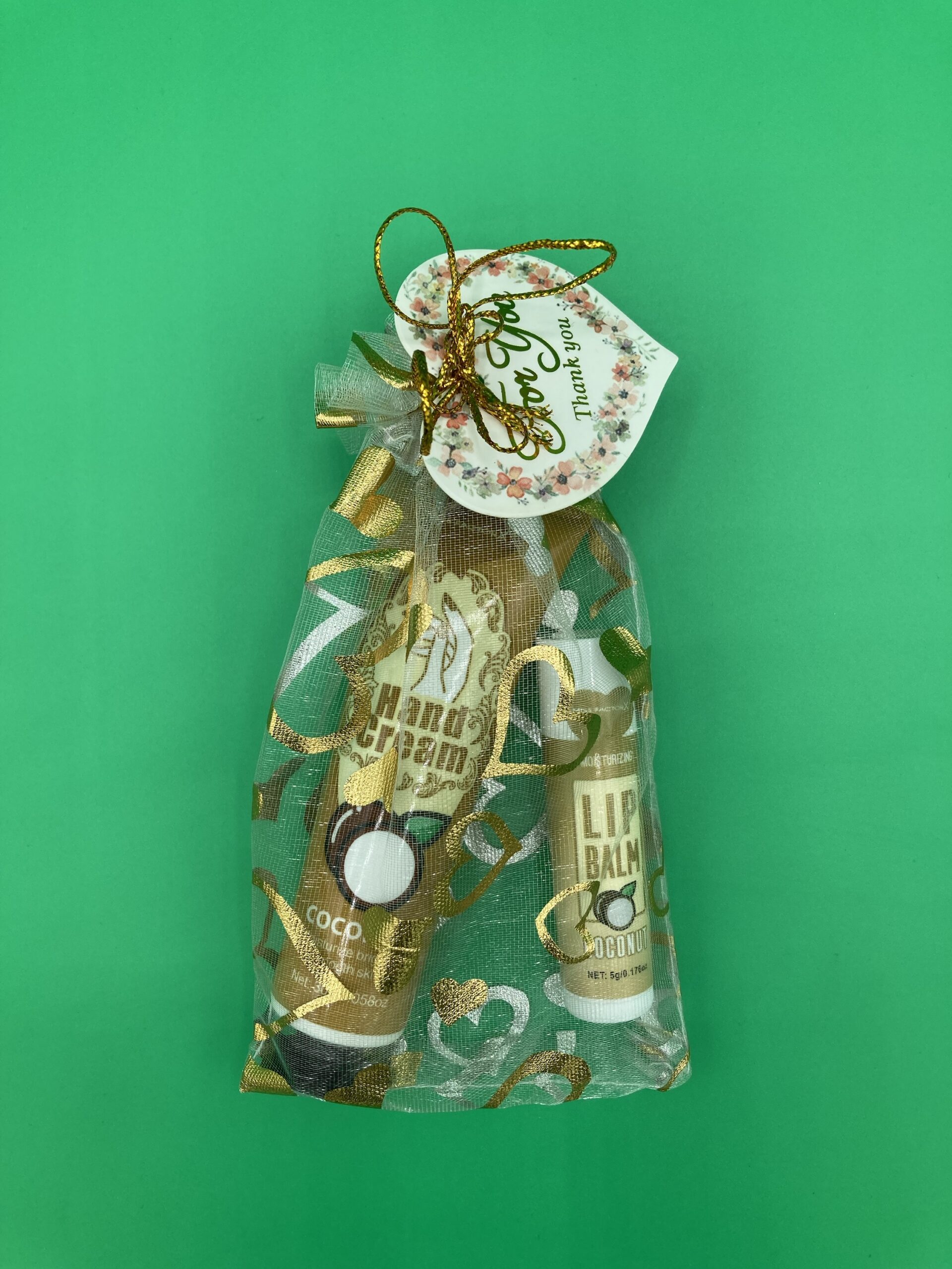 Kleines Dankeschön mit einer Handcreme und Lippenbalsam verpackt - Kokosnuss